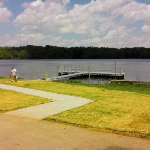Sidewalk and boat dock for handicap fishing.