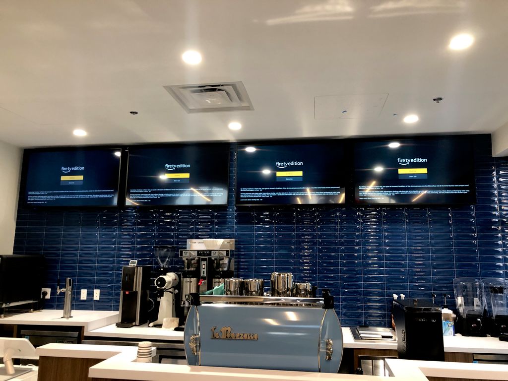 4 TVs on tile 