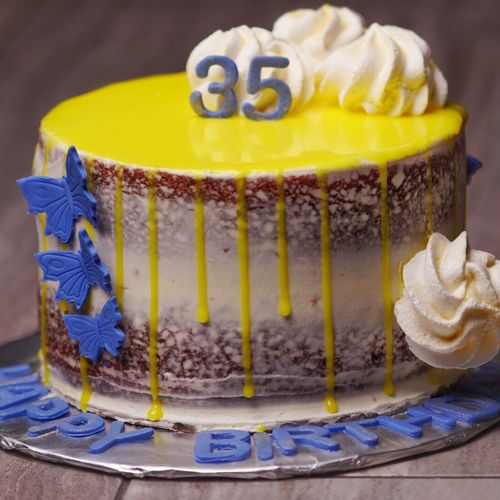 35th birthday - red velvet semi naked drip cake. B