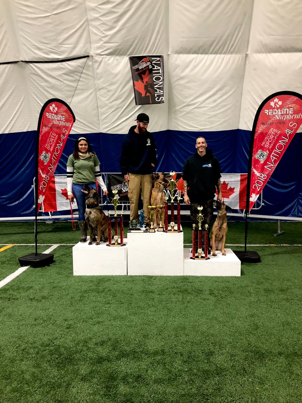 Joe with his dog Sybil on the podium for Protectio