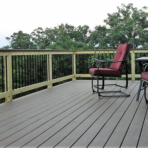 Composite deck with decorative handrail
