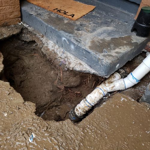 Sewer line repair with cleanout/access point 