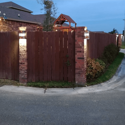 Attn Lawrence brick fence lighting installed in Mc