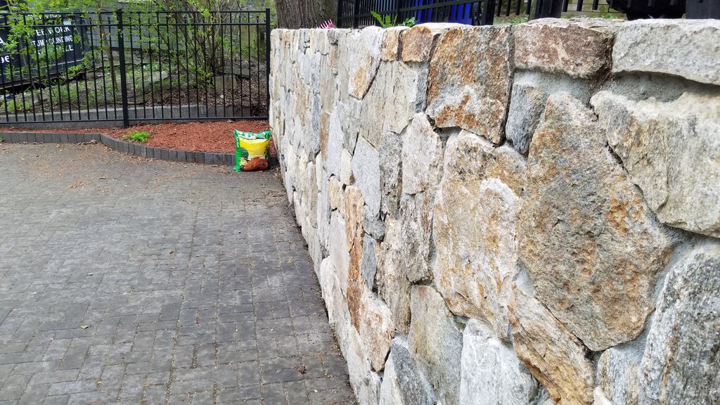 Stone retaining wall.
