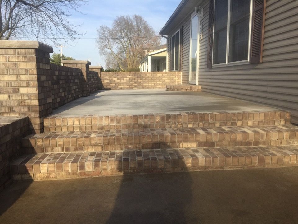 new steps and concrete porch