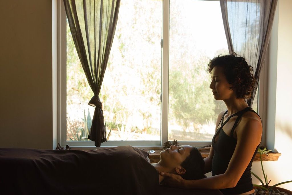 Massaging at a yoga retreat. 