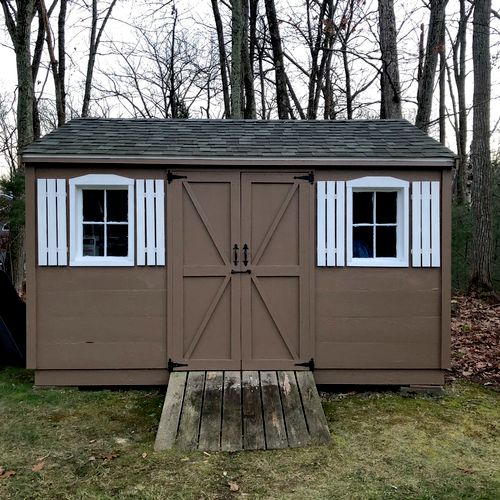 Shed restoration and painting project. Custom buil