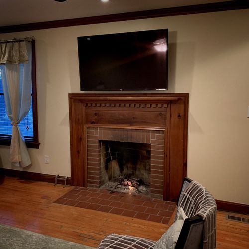 I repaired the brick in this fireplace and finishe
