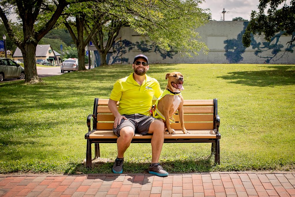 Owner Dustin and his roofing dog, Rufus
