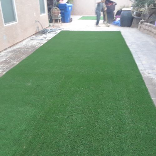 After picture artificial turf and pavers installat