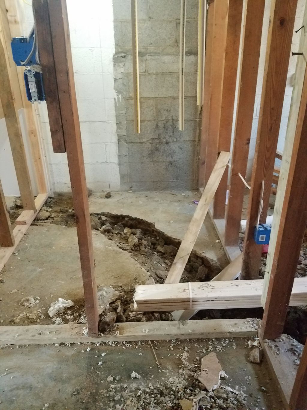 Basement Garage - Framing and Trench Dug for Bathr