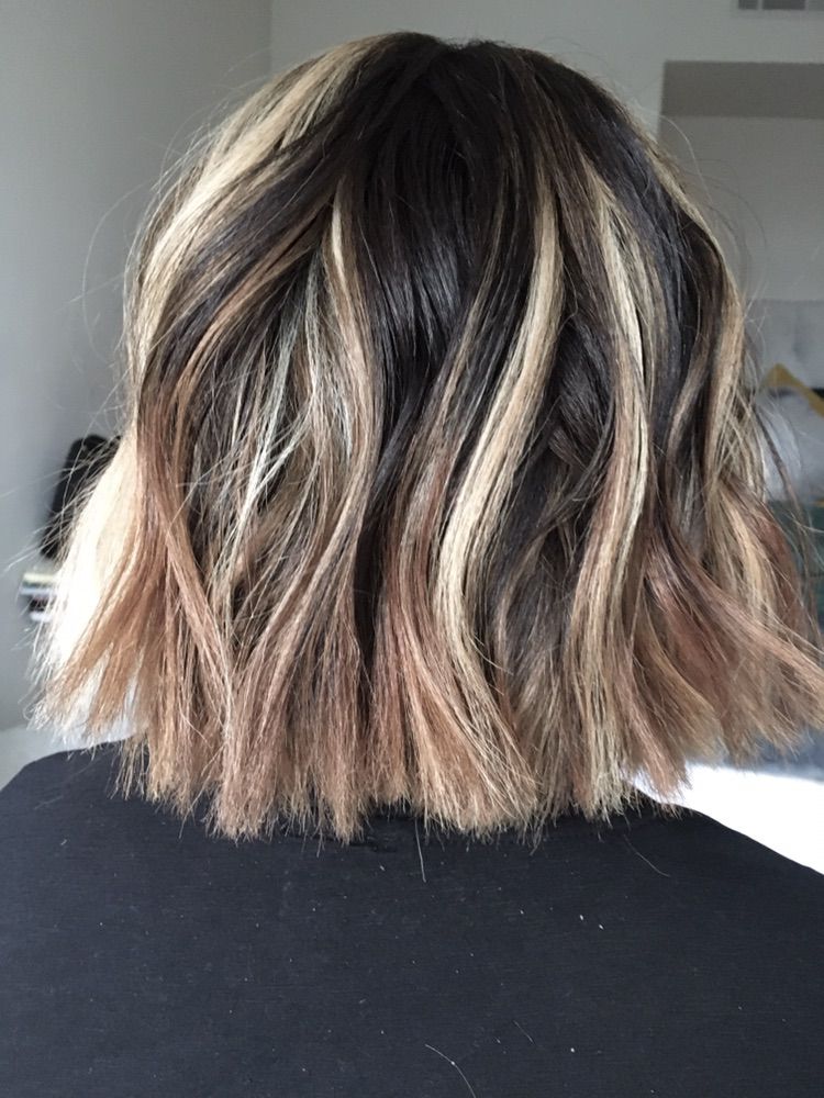 Custom color and cut tousle wavy style. (Back view