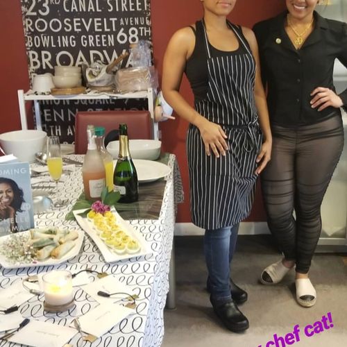 Chef Shanelle and chef cat hosting a book club eve