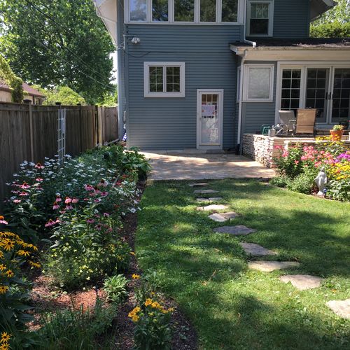 Backyard stone patio and planting