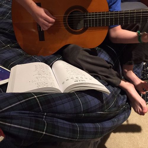 Andrew has been my 9 year old son's guitar teacher