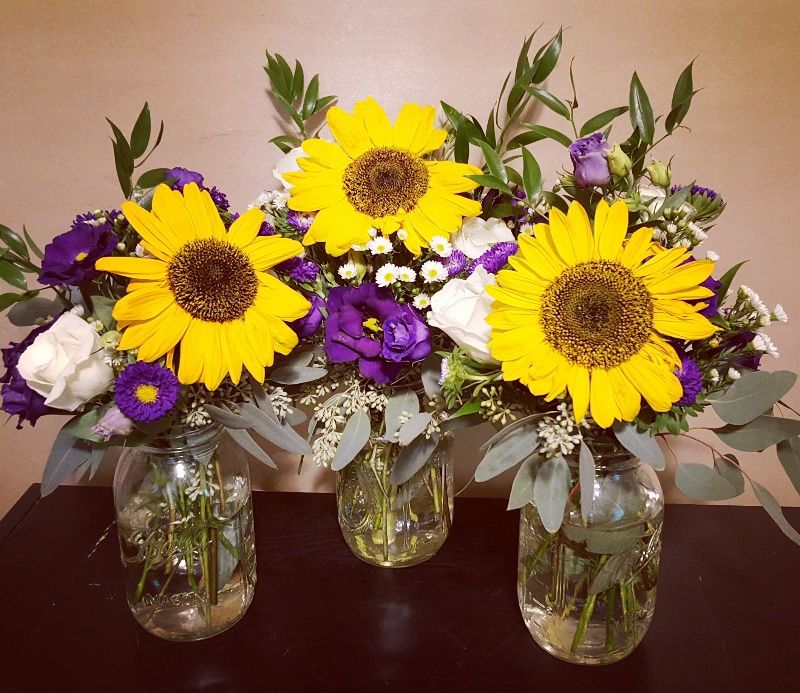 Bouquets for ceremony and centerpieces for the rec