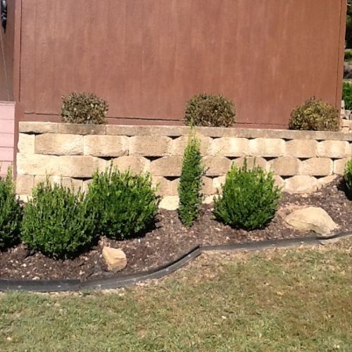 AAA Landscaping fixed an existing retaining wall t