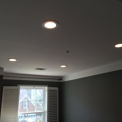 Brandon installed 4 can lights in a room where we 
