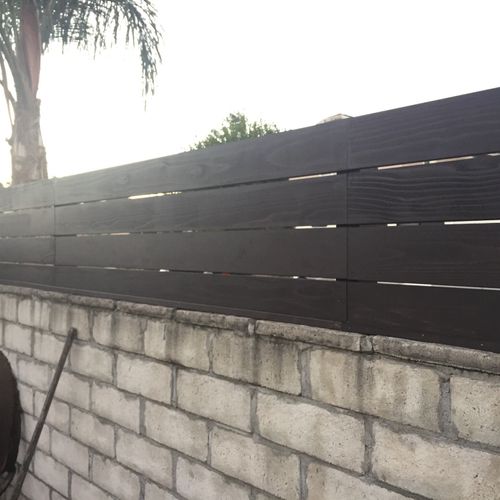 Juan installed a Beautiful horizontal fence on top