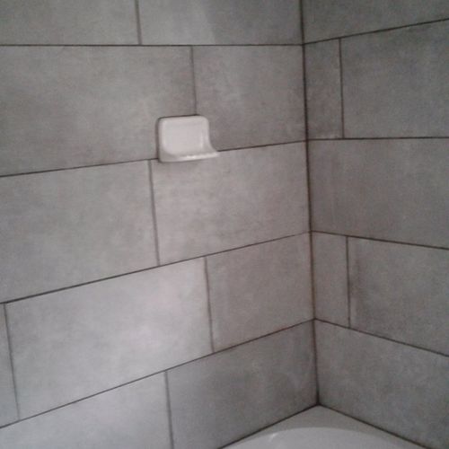 Rudy did a bathtub tile surround.  He hauled the m