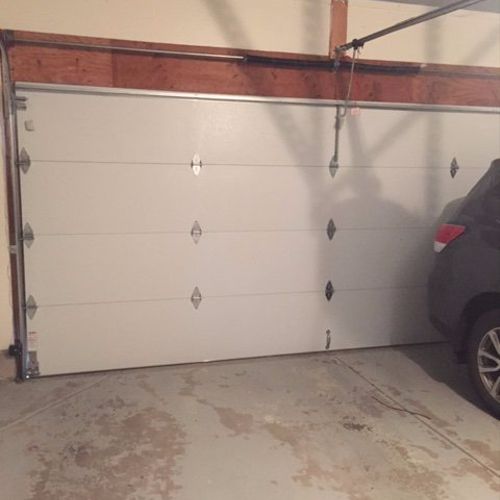 I installed a new garage door. Excellent job and s