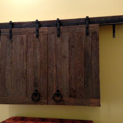 Jason made custom barn doors for our TV, and we co