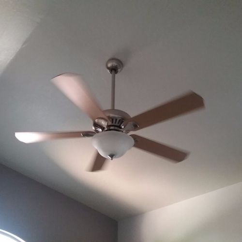 Updated bathroom lighting fixtures & ceiling fan.