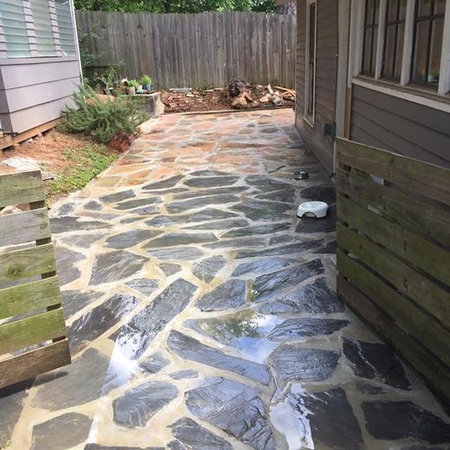 Max put in a slate and flagstone patio and a low r