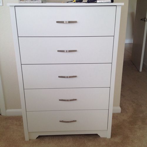 I asked him to assemble a 5 drawer dresser.
He was