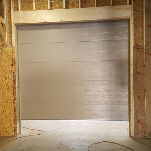 Andrew installed a 10x10 sectional insulated door 