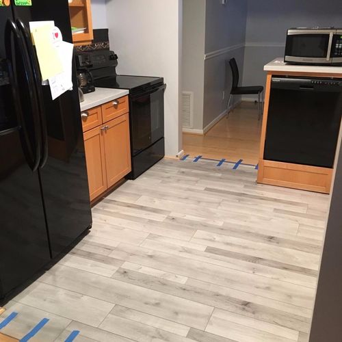 They replaced a kitchen laminate floor quite exper