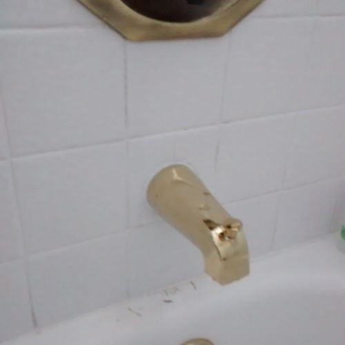 Two old bathtub spouts (the old spout stoppers no 