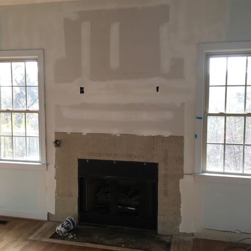We had a fireplace wall requiring drywall & cement