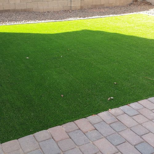 We had artifical turf with a paver boarder install
