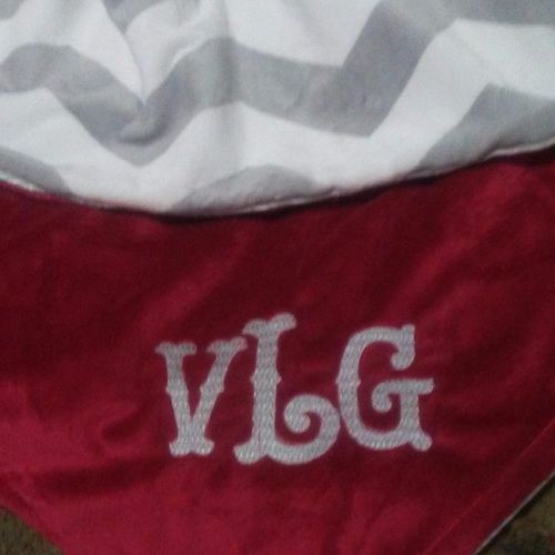 Monogrammed throw. Designer selected colors and fa