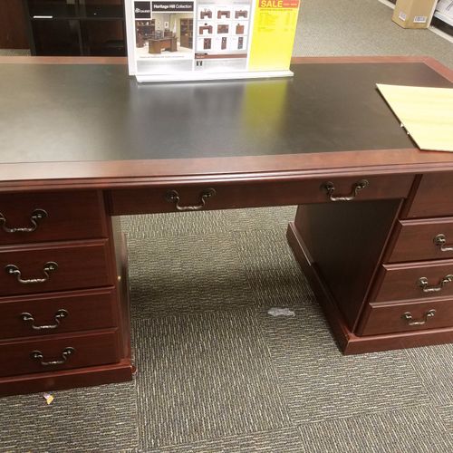 I bought the below executive desk at Office Depot.