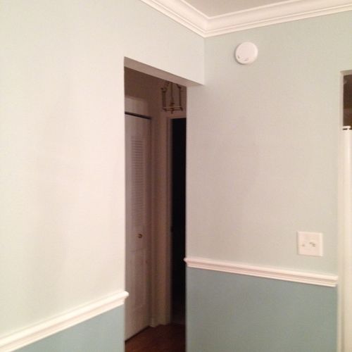 I had crown molding and chair rail installed.  The