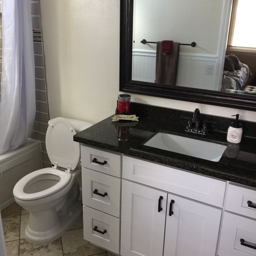 We hired ML construction for a bathroom remodel.  