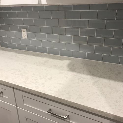We hired Ken to redo our backsplash and he did a g