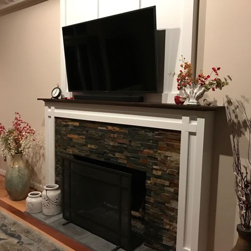 We had a new fireplace surround and mantle built w