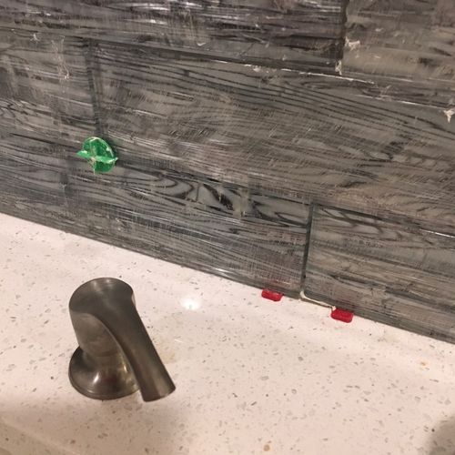 I had a tile kitchen backsplash installed. I chose