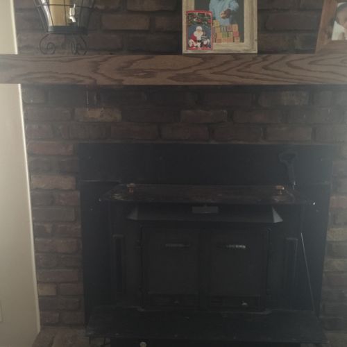 Me. Cotton built and installed a fireplace mantel.