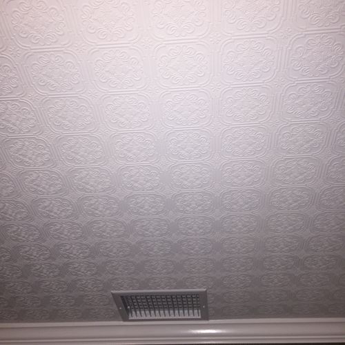 David wallpapered my ceilings. They look just amaz