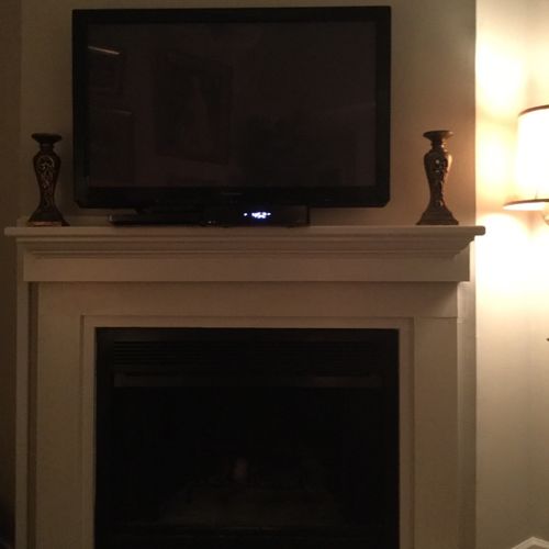 Nick mounted our tv over the fireplace and did a g