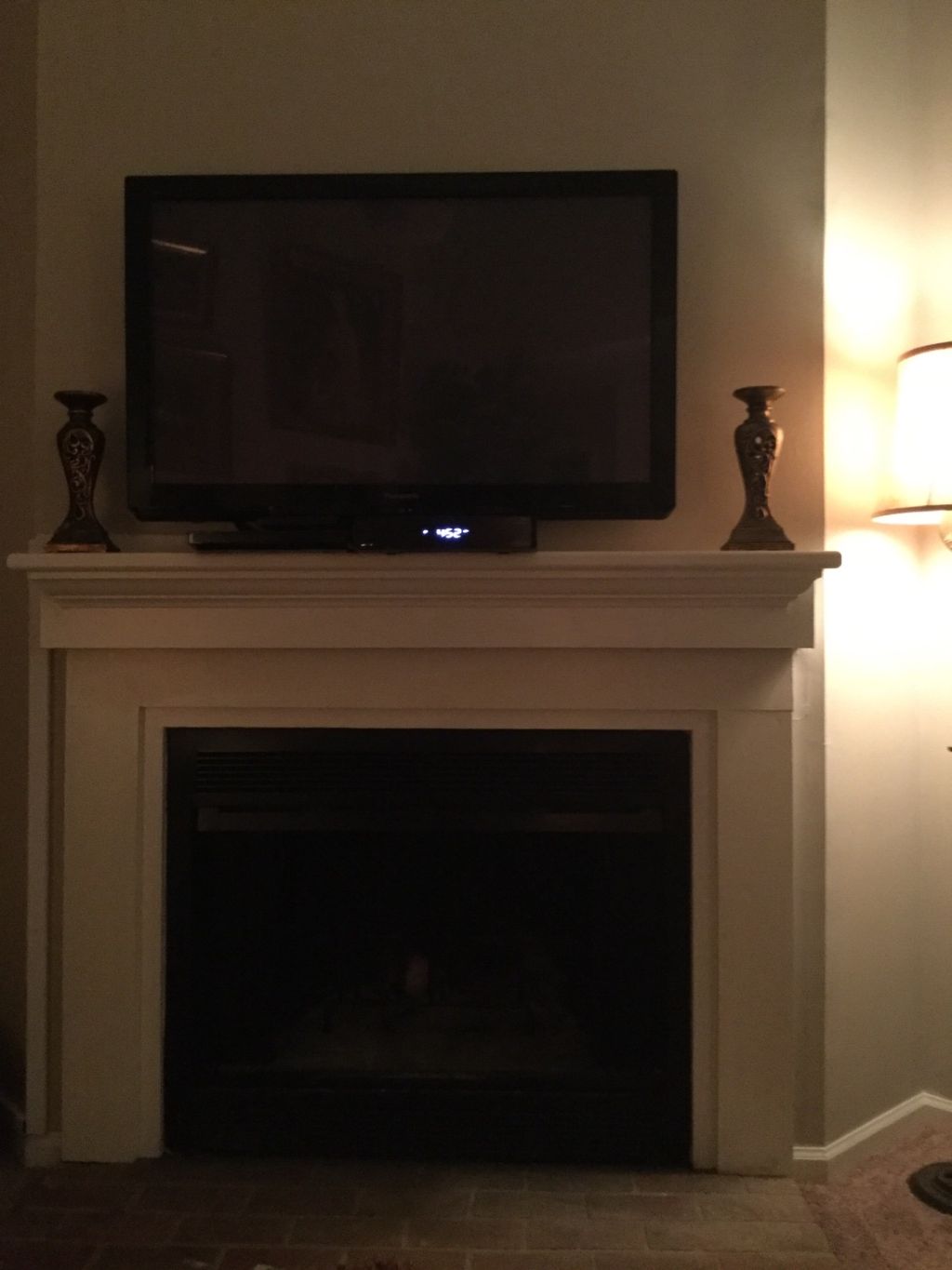 Nick mounted our tv over the fireplace and did a g