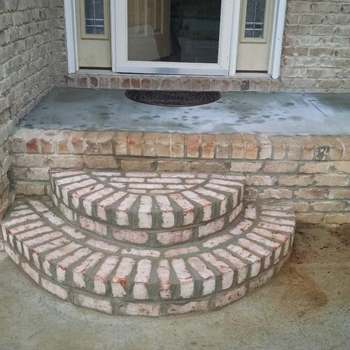 He built steps and treated our front porch (made s