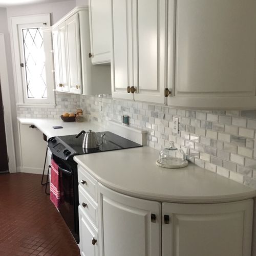 We hired Tim to install a marble backsplash in our