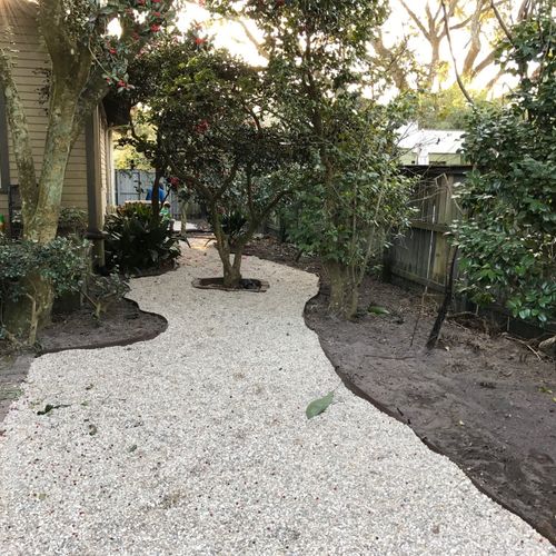 Greg installed a pea gravel path for us. He was po