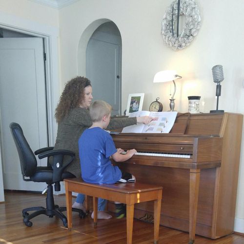 Megan teaches my son piano. He enjoys music and pl