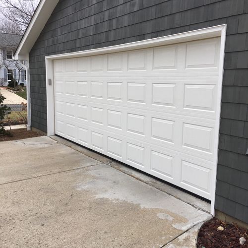 New garage door and opener with key pad installed.